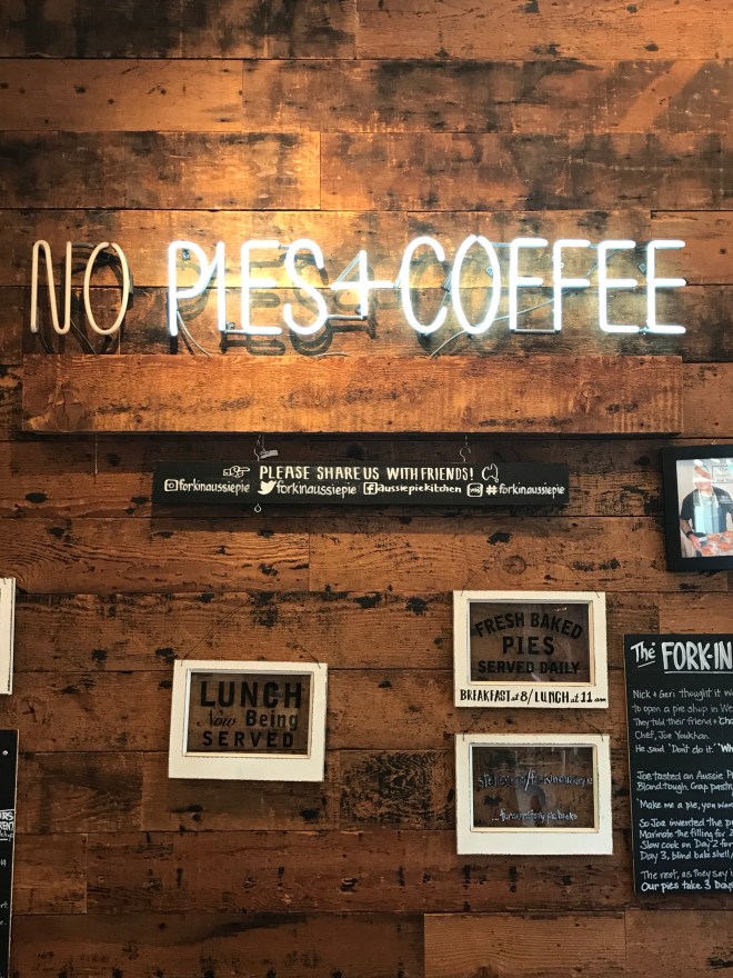 Wood panel wall featuring For in Pies